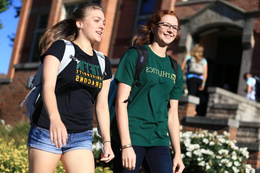 students walking on campus